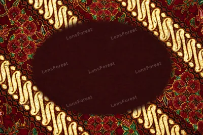 Rich crimson red and gold Indonesian batik textile pattern background with empty central copy space for text