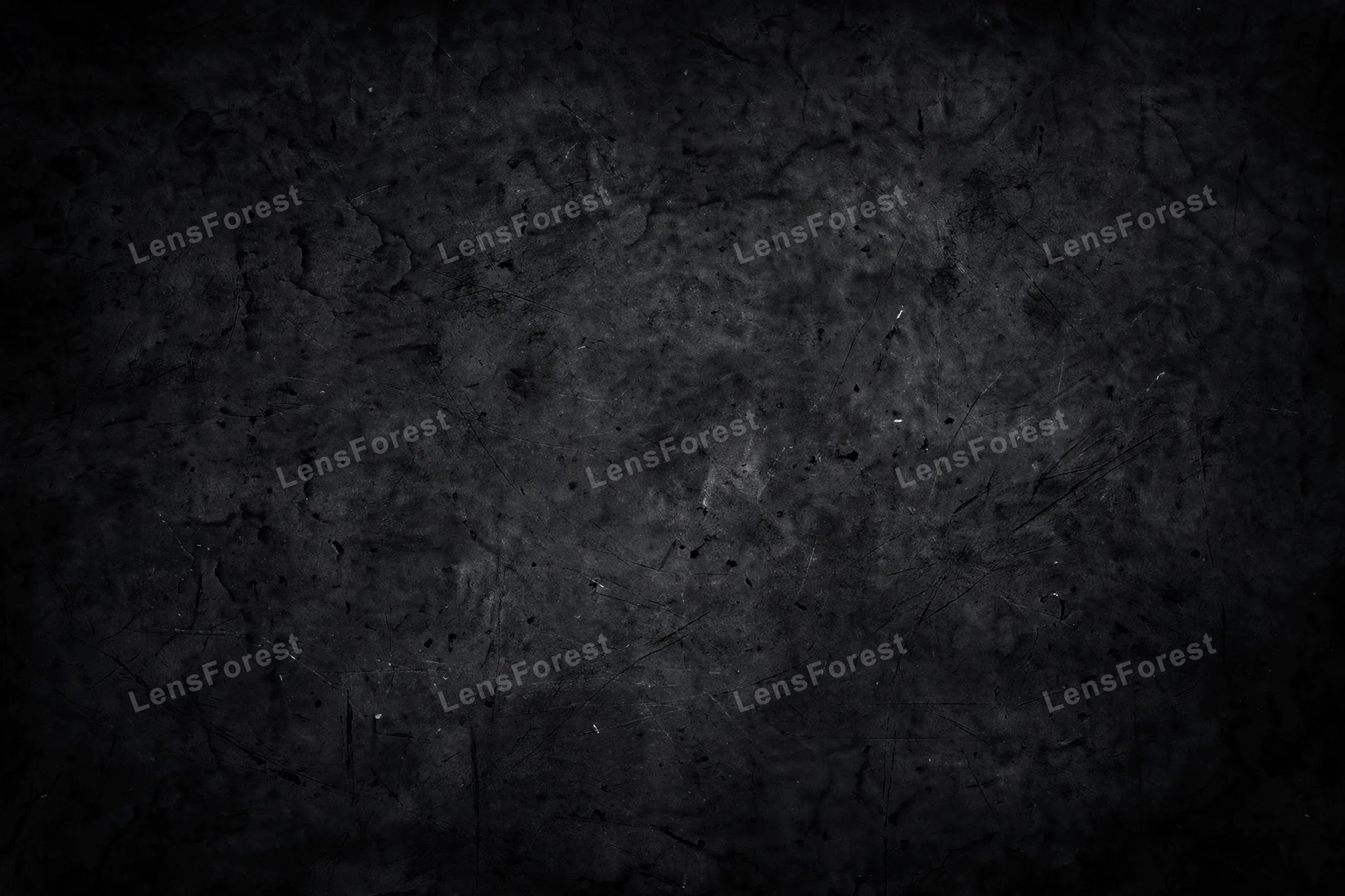 A dark grunge texture overlay with scratches, dust and worn marks on a black background, full frame