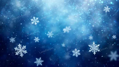 Delicate snowflakes falling over a soft ice blue background, a clean winter design with gentle bokeh